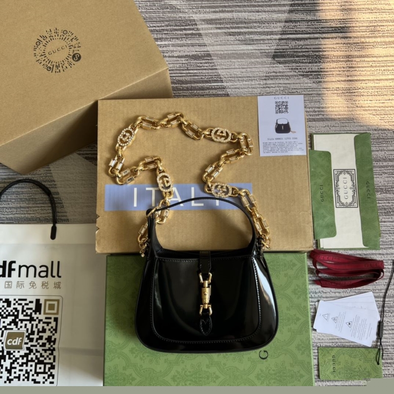G*u*i top handle bags